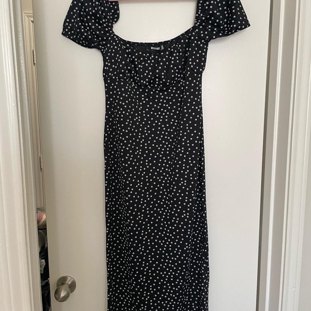 Black and white polka dot dress. Tight fitting